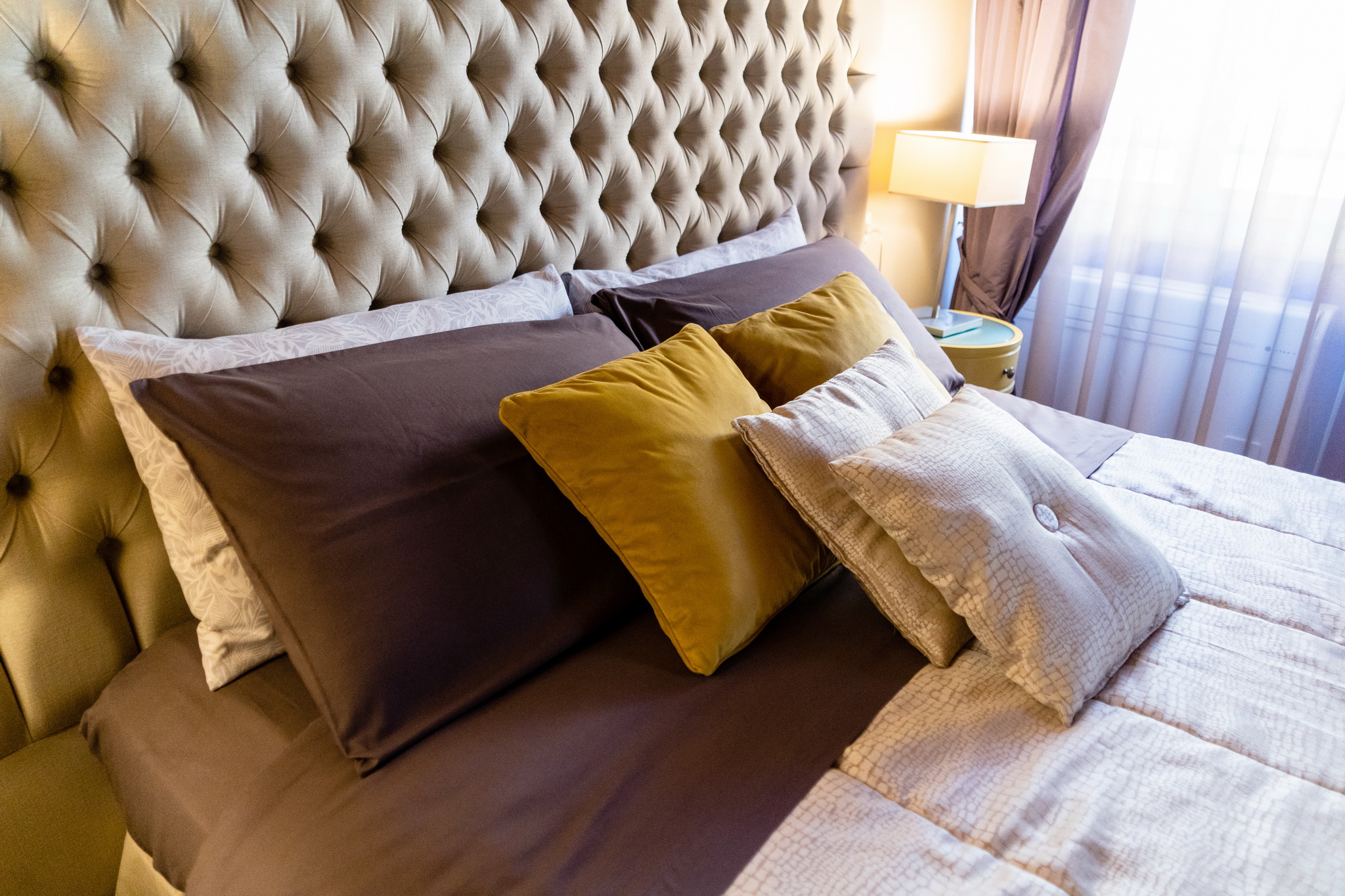 a picture about the room, bed and coach
